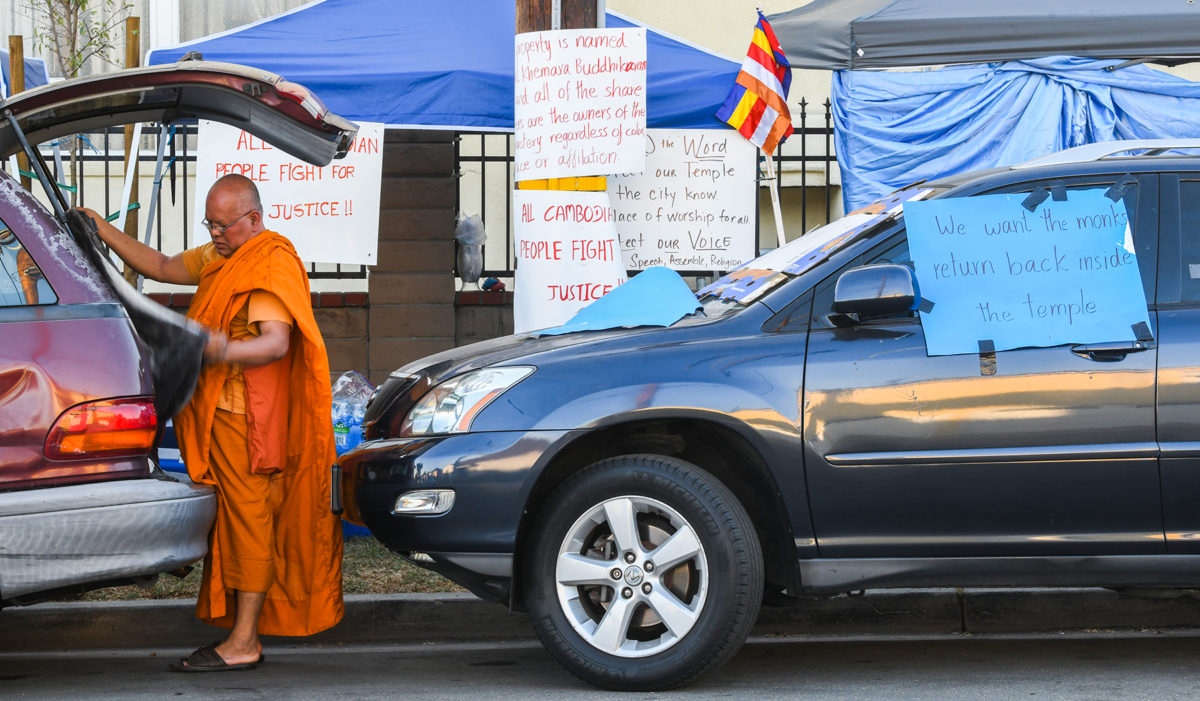 Dispute between Buddhist temple’s board and its congregation leaves monks out in the streets.